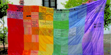 A Latinx flag flourishing with community collaboration in North County