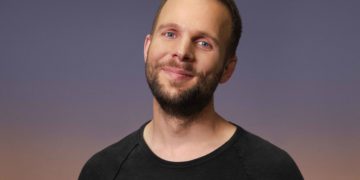 Tom Goss puts the guitar down and joins in the fun at Martinis Above Fourth